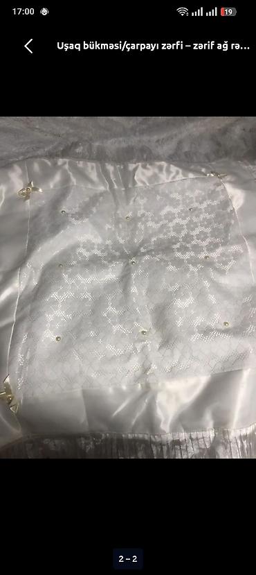 xestexana cıxışı: Uşaq bükməsi/çarşaf-zərf – zərif ağ rəngdə - Material: atlas parça və — 2