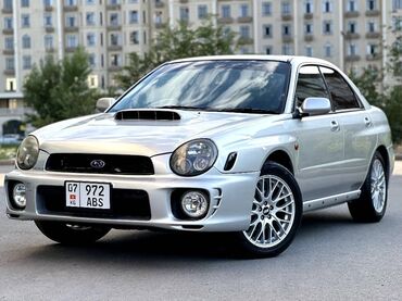 колпачки субару: Subaru Impreza: 2 л | 2001 г. | Седан