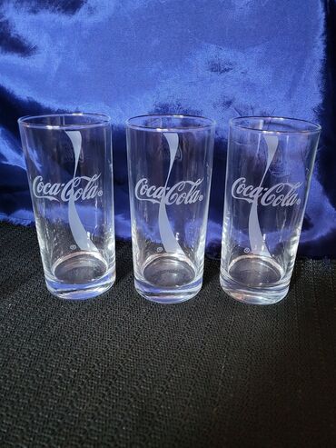 Čaše: Case nove Coca Cola vintaz. Komada 6 u ceni,sve na casama odsjaj od — 8