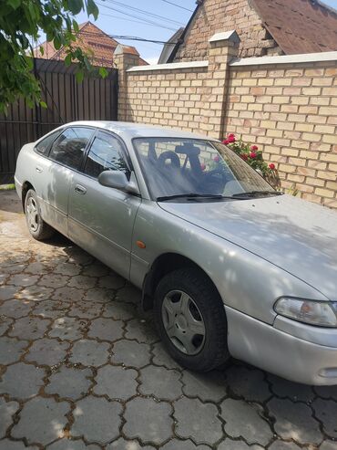 Mazda: Mazda Cronos: 1994 г., 1.8 л, Механика, Бензин, Хэтчбэк