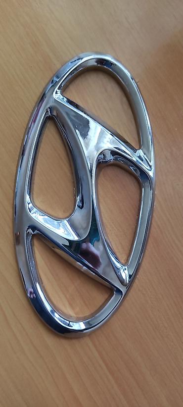 hyundai emblem: Hyundai avtomobilləri üçün ön radiator barmaqlığı/kapot emblemi — 1