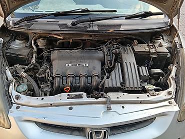 byd e6: Honda Fit: 2002 г., 1.3 л, Вариатор, Бензин, Лимузин — 6