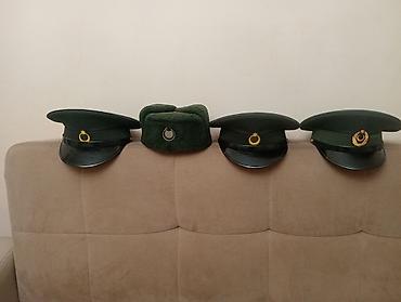 klassik geyim: Məhsul: Hərbi üslubda papaq dəsti Tərkib: - 3 ədəd tünd-yaşıl rəngli — 1
