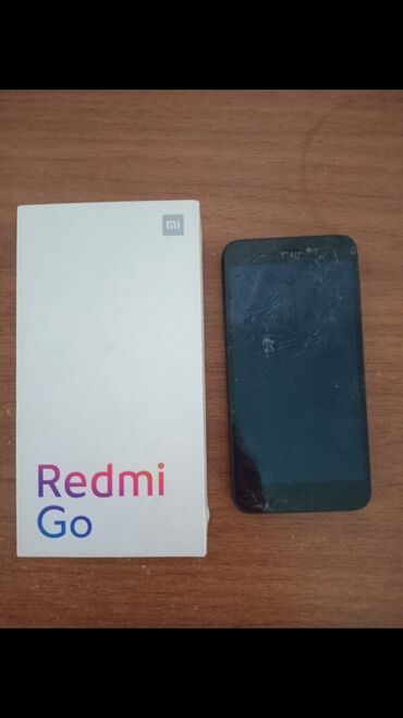 tecili satilan telefonlar: Xiaomi Redmi Go, 16 GB, rəng - Qara, 
 Qırıq, Sənədlərlə