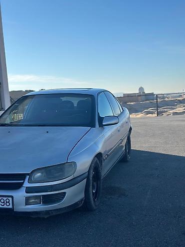 Opel: Opel Omega: 2 l | 1999 il Sedan — 7