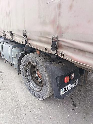 yuk maşnı: DAF XF dartqı (traktor) və tentli qoşqu • Marka/model: DAF XF • — 4