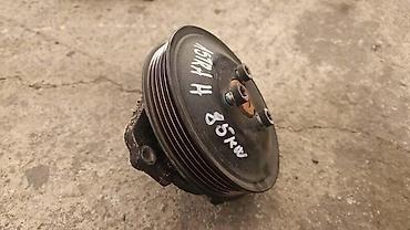 alat 52: VODENA PUMPA REMENICA 1.8 85KW ZA OPEL ASTRA H ZA 2008. GOD — 1