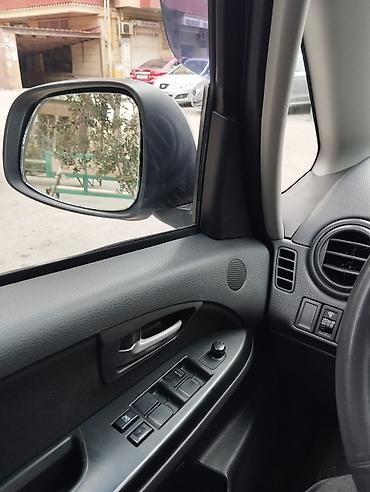 suzuki moto: Suzuki SX4 – gümüşü rəngli, şəhər və rayon yolları üçün praktik — 6