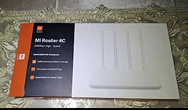 iphoni 11: Xiaomi Mi Router 4C – 300 Mbps Wi‑Fi router Xüsusiyyətlər: - 2.4 GHz — 6