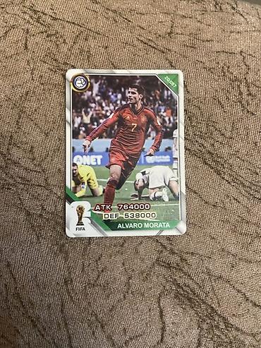 kart oyunları: Məhsul: Futbol kolleksiya kartı – “Alvaro Morata” Təsvir: - Önlükdə — 1