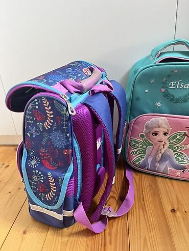 Məktəb çantaları: Uşaq üçün Elsa temalı məktəb çantası. Xüsusiyyətlər: - Rəng: firuzəyi — 9