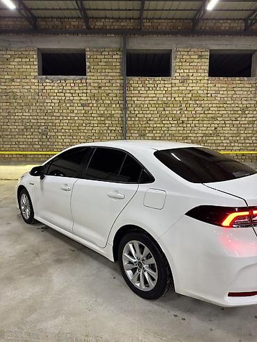 camry 70 se: Toyota Corolla: 2023 г., Гибрид, Седан — 5