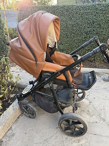 carello alfa: Детская коляска 2 в 1 в стиле эко-кожи (карамельно-коричневый цвет) — 1
