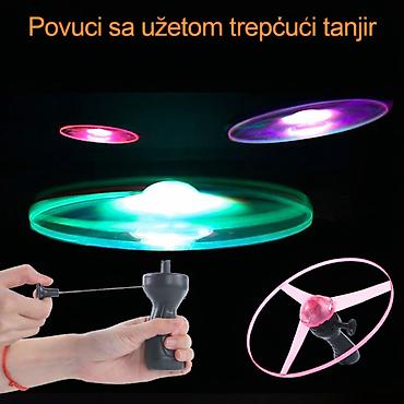 Ostalo: Nov svetleći leteći disk. Ima tri LED boje crvena, zelena i plava — 2
