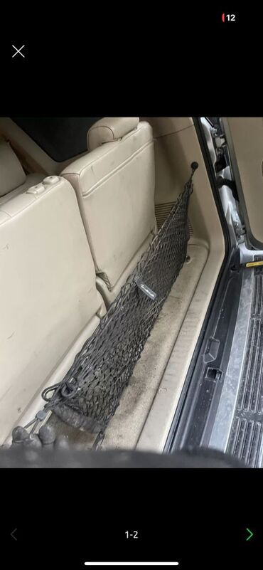 Другие аксессуары для салона: Сетка салона в багажник на Lexus