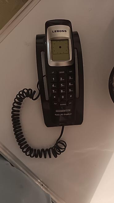 LEBOSS stolüstü/çininə asılan simli telefon Xüsusiyyətlər: - Model