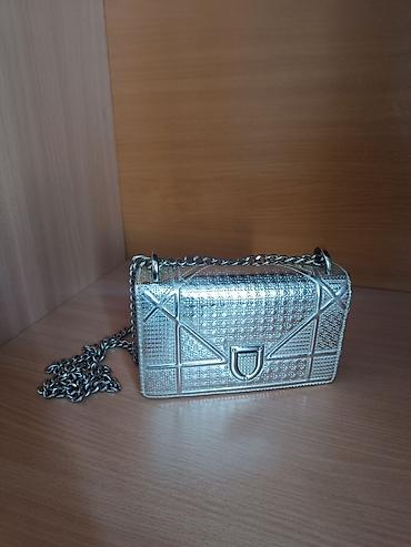 Çiyin çantası, Dior, İşlənmiş