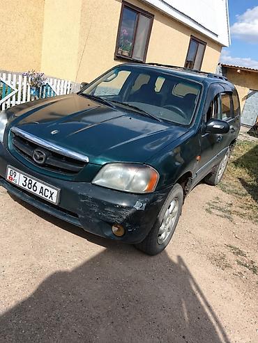 делаем справки: Mazda Tribute: 2001 г., 2 л, Механика, Бензин, Кроссовер — 3