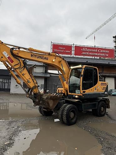 Экскаваторы: Экскаватор, Hyundai, 2014 г., Колесный — 2