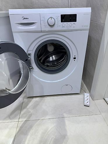 телефон сотка: Стиральная машина Midea MF60-S1006 Slim, фронтальная загрузка — 1