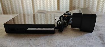 mini wifi router: Səyahət Routeri – kompakt Wi‑Fi cihazı (adapter ilə) Xüsusiyyətlər: - — 3