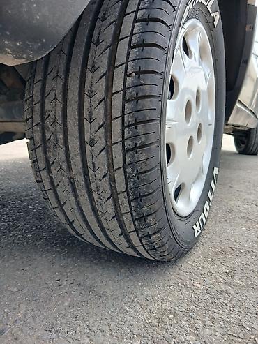 Şin və təkərlər: İşlənmiş Şin Formula 215 / 50 / R 13 — 9