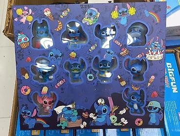 hello kitty duks: Veliko STIC pakovanje sa 10 Stitch figurica Pakovanje sadrži 10 — 1