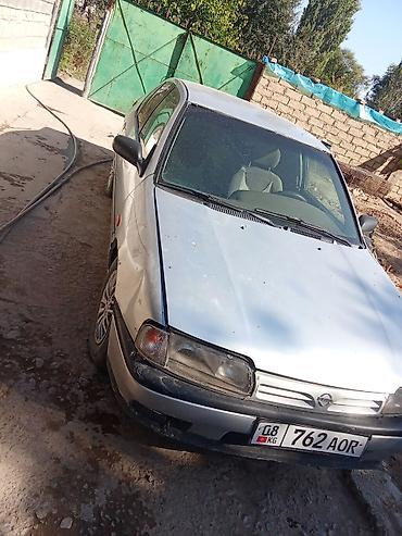 купить прикуриватель: Nissan Primera: 1990 г., 2 л, Механика, Бензин, Хэтчбэк — 5