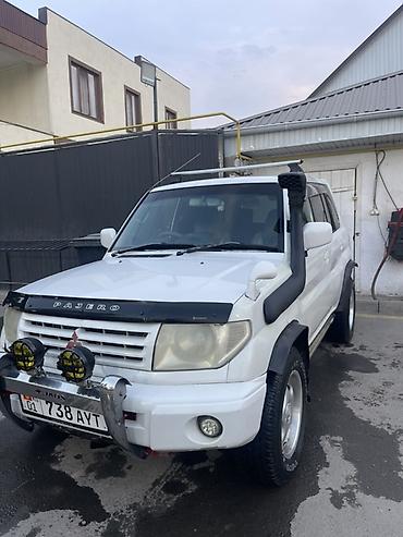 бампер задний е34: Mitsubishi Pajero iO: 1999 г., 1.8 л, Автомат, Бензин, Внедорожник — 2