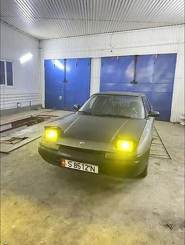 коврик бу: Mazda 323: 1991 г., 1.8 л, Механика, Бензин, Хэтчбэк — 2