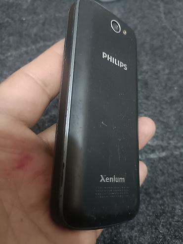 nokia e52: Philips Xenium E560 — оригинальный кнопочный телефон. батарейку держит — 2