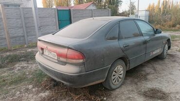 купить кожаные сиденья для авто бу: Mazda 626: 1992 г., Механика, Бензин, Седан