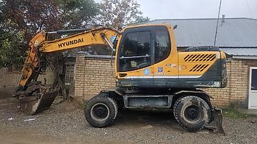 Экскаватор, Hyundai, Колесный