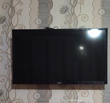 irsad electronics samsung: Samsung markalı geniş ekran televizor. Qara çərçivəli, zərif və sadə — 1