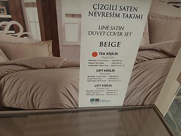 qrusa satisi: Bej rəngdə, zolaqlı saten materialdan nevresim takımı. Qutulu dəstdir — 1