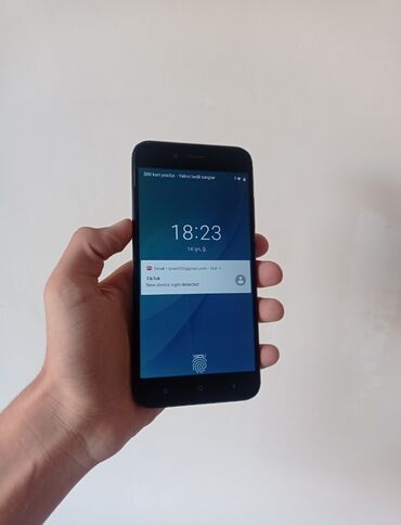 xiaomi 10 t: Xiaomi Mi A1, 64 GB, rəng - Qara, 
 İki sim kartlı, Barmaq izi
