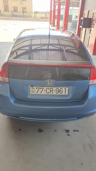 165 60 14: Honda Insight hibrid hetçbek, mavi rəngdə təqdim olunur. Avtomobilin — 7