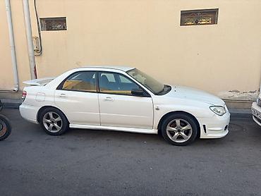 kovş: Subaru Impreza: 2 l | 2007 il 301000 km Sedan — 1