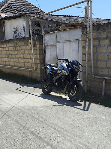 07 oturacaq: Bajaj — 2