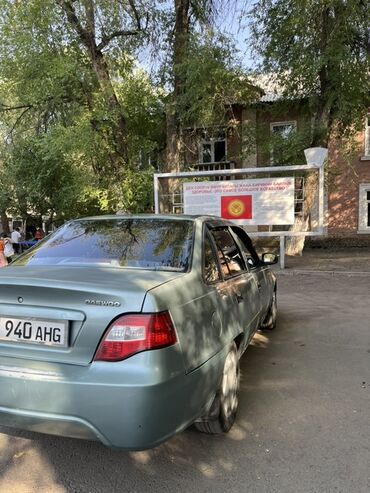 нексия 3 цена в бишкеке: Седан Daewoo Nexia серо-голубого цвета, оснащенный четырехдверным