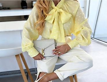 Bluze: 🔥Ženska elegantna bluza sa mašnom i tufnama
✅2400 din — 2