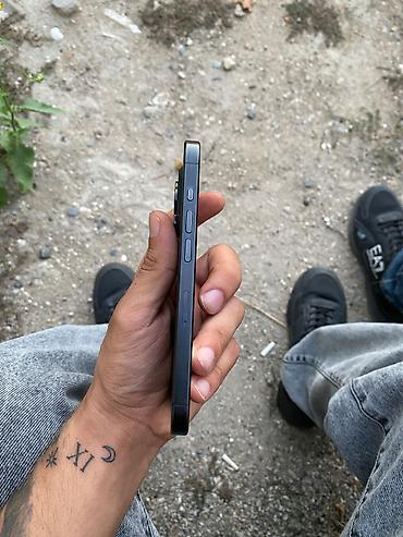 IPhone 15 Pro, 128 GB, Black Titanium, Barmaq izi, Simsiz şarj lalafo.az -da IPhone 15 Pro, 128 GB, Black Titanium, Barmaq izi, Simsiz şarj