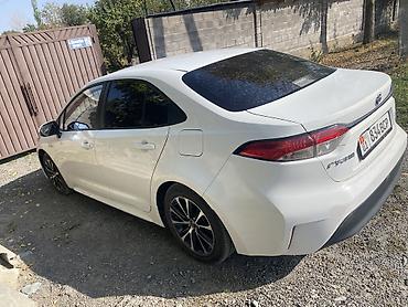 Toyota: Toyota Corolla: 2023 г., 1.8 л, Автомат, Гибрид, Седан — 2