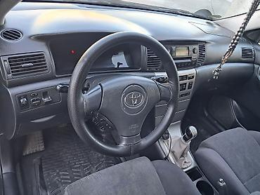 coroll: Toyota Corolla: 2003 г., Механика, Бензин, Универсал — 4