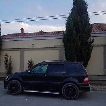 Mercedes-Benz: Mercedes-Benz M-Class (W163) SUV - Kuzov: qara rəng, şəhər və uzun — 4