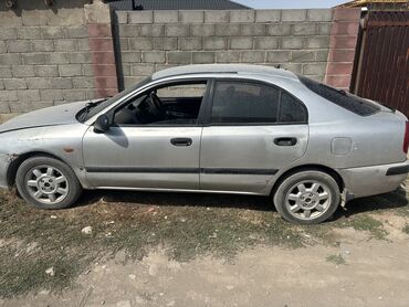 ролс ройс машина: Автомобиль Mitsubishi Carisma в кузове седан, окрашенный в серебристый