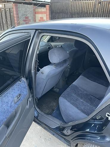 машинка б у: Mazda 323: 1999 г., 1.6 л, Механика, Бензин, Седан — 7