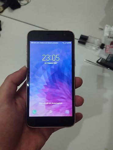 ses ucaldan: Samsung Galaxy J2 Core, 8 GB, rəng - Qızılı — 6