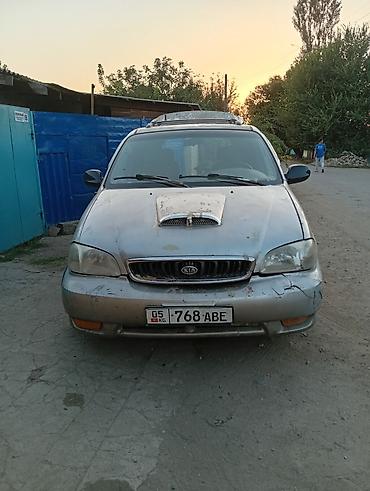cadillac ats: Kia Carnival: 1998 г., Минивэн — 10