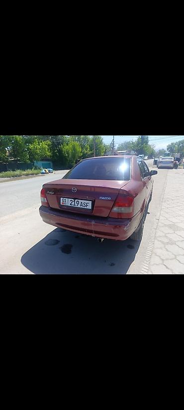 обмен на квартиры: Mazda 323: 2001 г., 1.8 л, Автомат, Бензин, Седан — 6